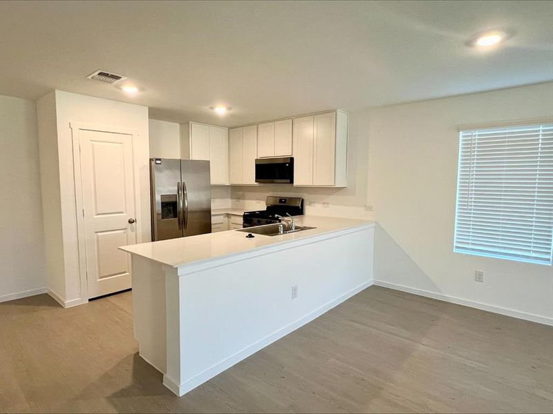 Furnished interior view inside a new home in Travis Heights, Sherman (Image 3).