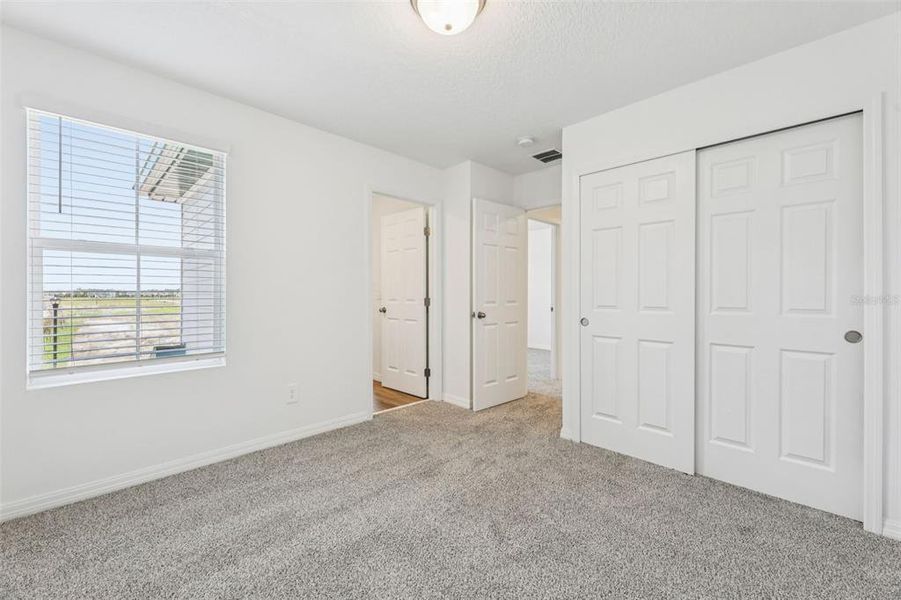 Spacious, unfurnished interior of a new home in The Meadow at Crossprairie Townes, St. Cloud (Image 21).