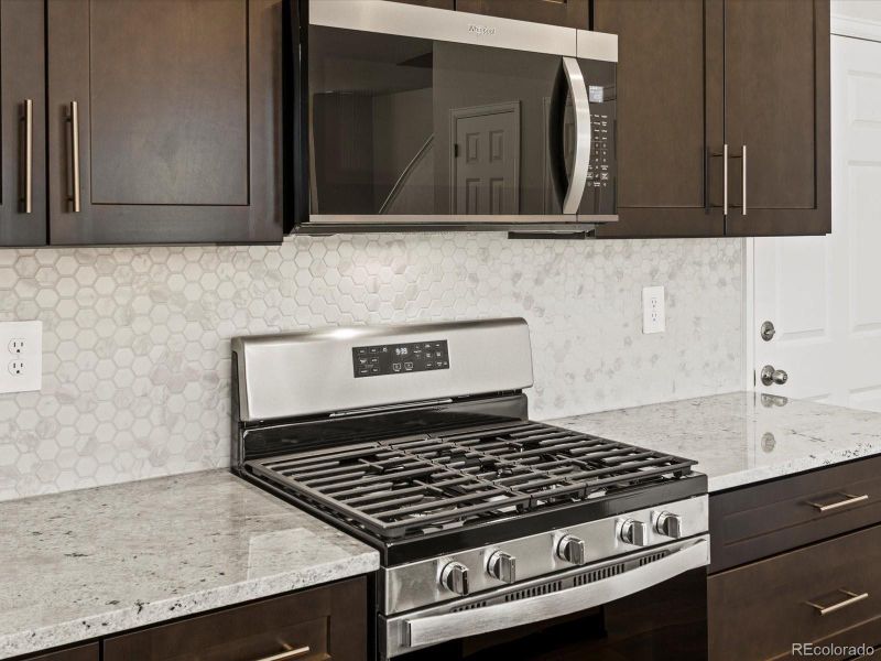 Furnished interior view inside a new home in Skyview at High Point, Aurora (Image 5).