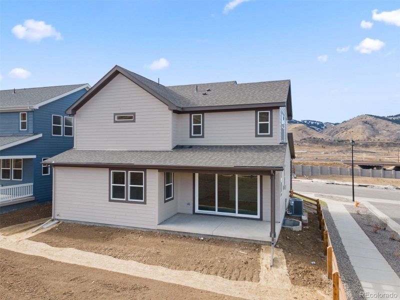 Exterior details and patio area of a home in The Manors Collection at Golden Overlook, Golden (Image 27).