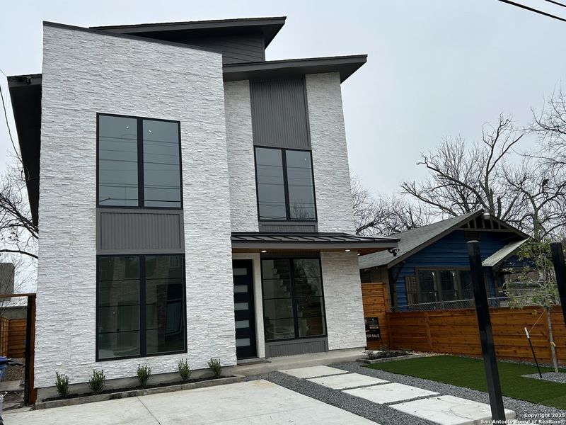 Front exterior of a new home in , San Antonio, TX, highlighting curb appeal (Image 2).