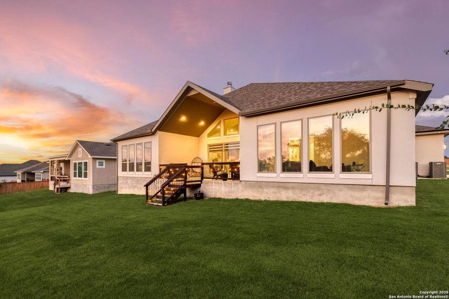Front exterior of a new home in Megan's Landing 1/2 Acre, San Antonio, TX, highlighting curb appeal (Image 19). Front exterior of a new home in Megan's Landing 1/2 Acre, San Antonio, TX, highlighting curb appeal (Image 19).