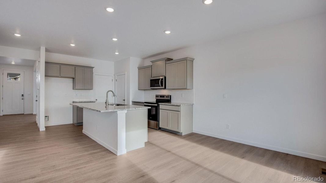 Furnished interior view inside a new home in Settlers Crossing, Commerce City (Image 6).