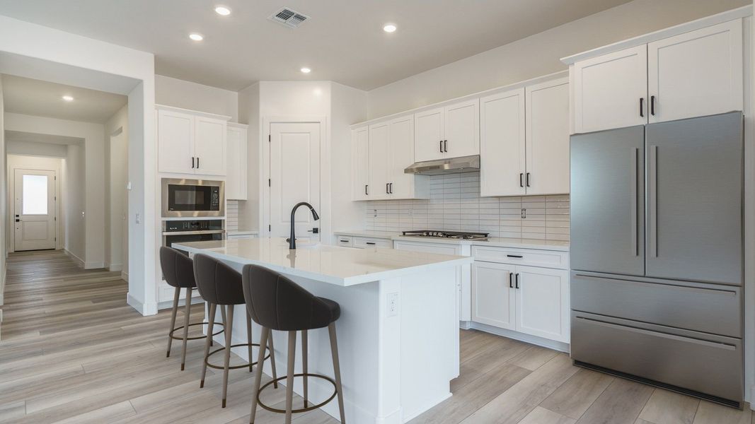 Representative furnished interior of a home built from the Pinehurst by William Ryan Homes in Fairways in Victory at Verrado, Buckeye (Image 13).