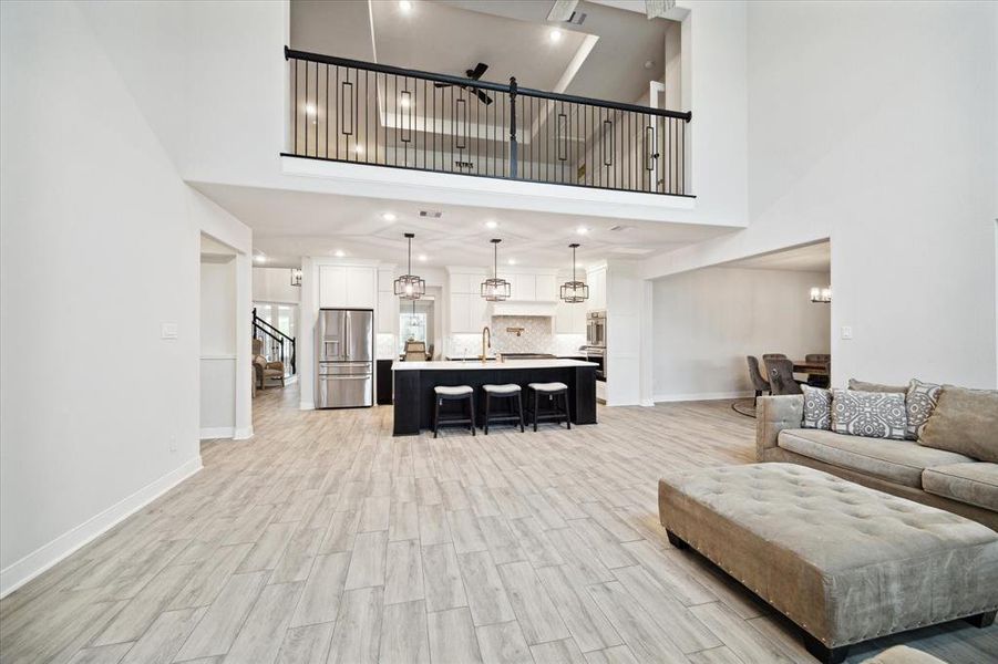 Game room overlooks into the living room.