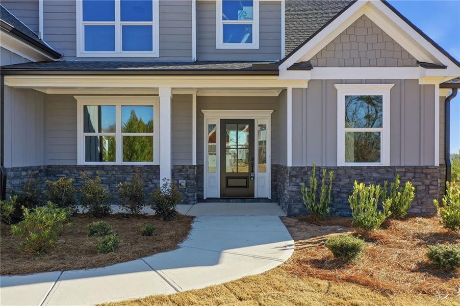 Exterior details and patio area of a home in , Ball Ground (Image 24).