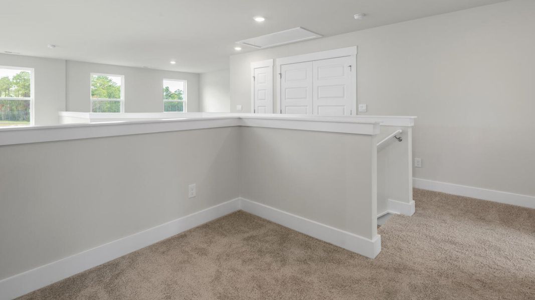 Spacious, unfurnished interior of a new home in Indigo Preserve Townhomes, Leland (Image 26).