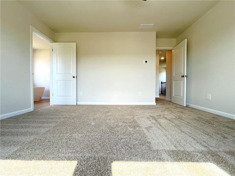 Spacious, unfurnished interior of a new home in River Walk Farm, Covington (Image 14).