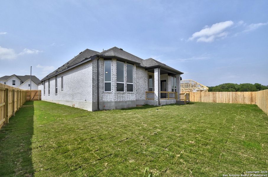 Front exterior of a new home in Alsatian Oaks: 60ft. lots, Castroville, TX, highlighting curb appeal (Image 2).