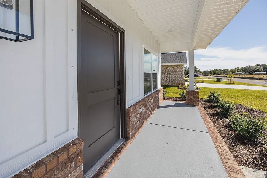 Exterior details and patio area of a home in Parkland Place, Pace (Image 3).