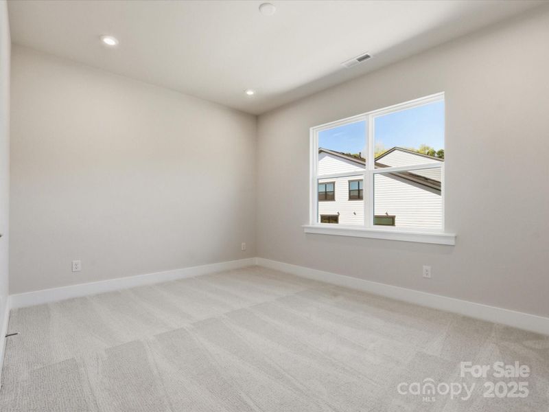 Secondary Bedroom With 9' Ceilings.
