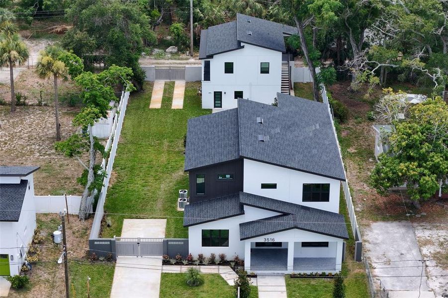 Front exterior of a new home in , St. Petersburg, FL, highlighting curb appeal (Image 31). Front exterior of a new home in , St. Petersburg, FL, highlighting curb appeal (Image 31).