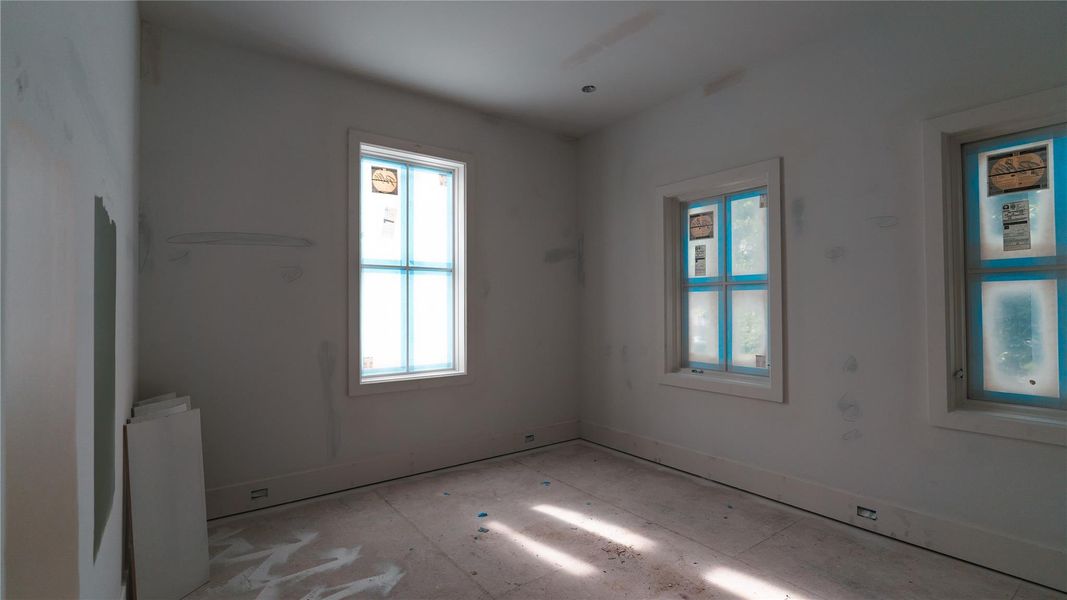 Upstairs bedroom is in the treetops, and drenched in natural light.