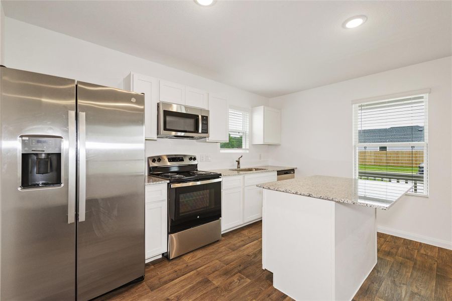 Furnished interior view inside a new home in Marie Village, Conroe (Image 5).