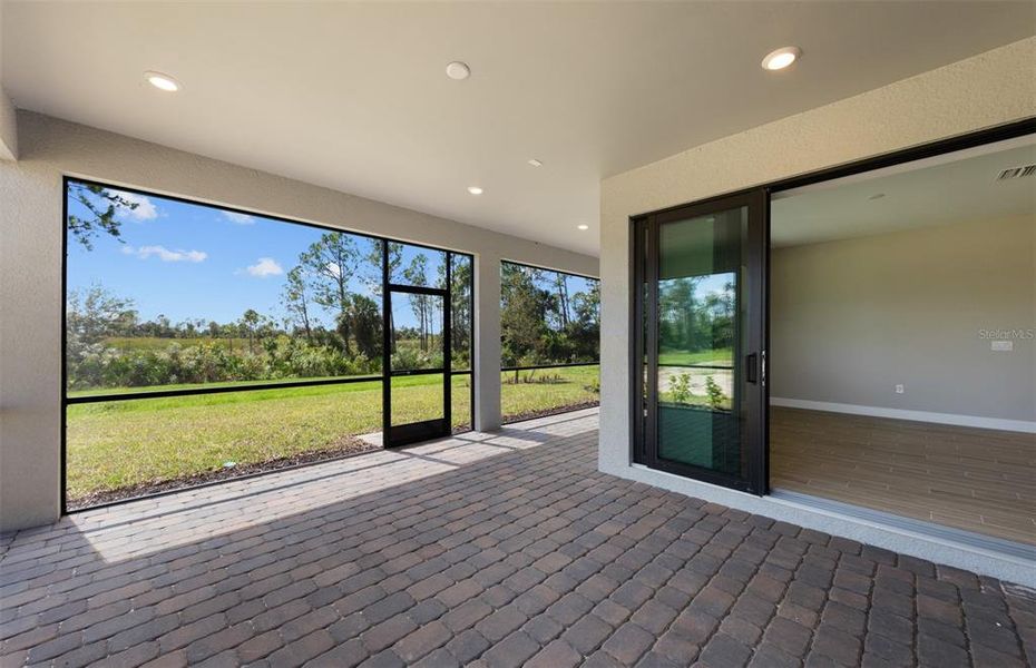 Exterior details and patio area of a home in , North Port (Image 21).