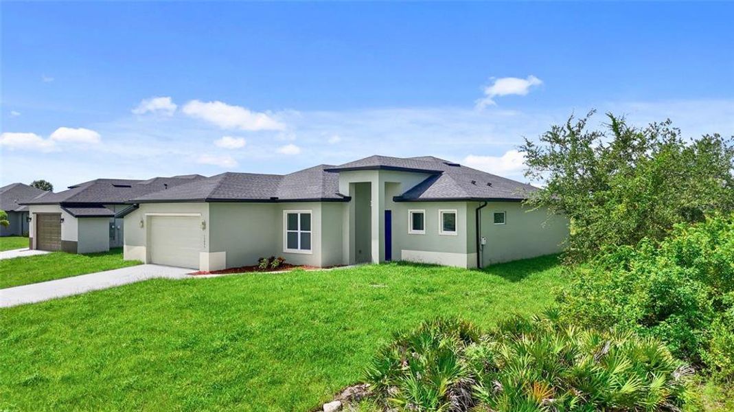Front exterior of a new home in , Port Charlotte, FL, highlighting curb appeal (Image 20).