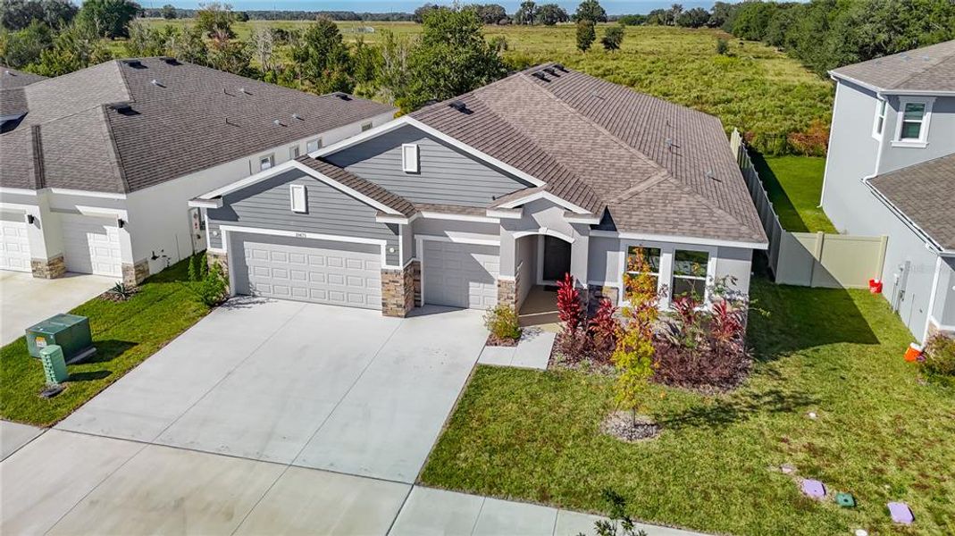 Front exterior of a new home in Mirada, San Antonio, FL, highlighting curb appeal (Image 26).
