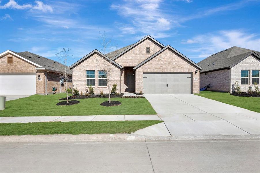 Front exterior of a new home in Verandah, Royse City, TX, highlighting curb appeal (Image 20).