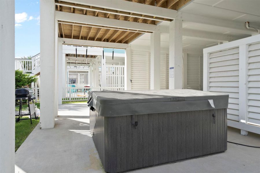 Elevate your coastal lifestyle with this covered outdoor retreat on the ground floor—perfect for weekend grill gatherings or future hot tub relaxation. Framed by open green space and coastal breezes, it’s a versatile extension of comfort and style. Elevate your coastal lifestyle with this covered outdoor retreat on the ground floor—perfect for weekend grill gatherings or future hot tub relaxation. Framed by open green space and coastal breezes, it’s a versatile extension of comfort and style.