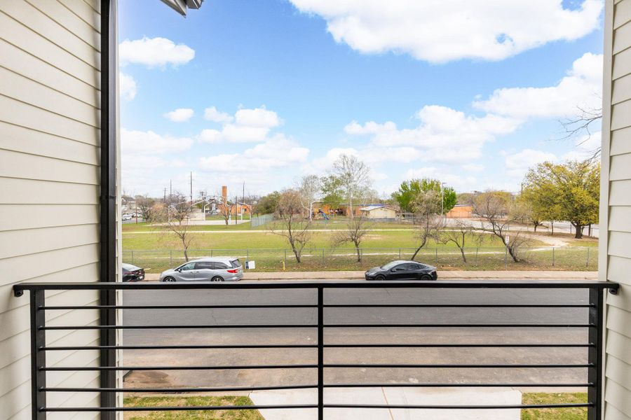 Gate with a balcony and a residential view