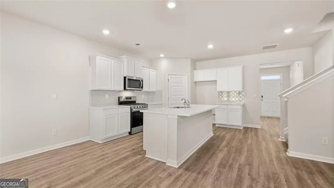 Furnished interior view inside a new home in Twin Lakes, Hoschton (Image 3).
