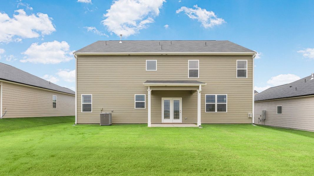 Exterior details and patio area of a home in Highland Hills, Graniteville (Image 2).