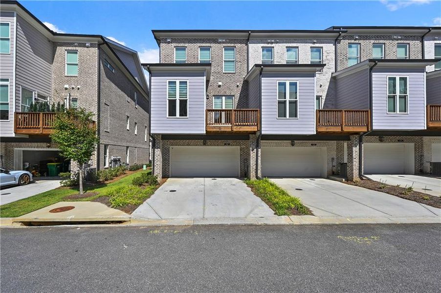 Front exterior of a new home in , Johns Creek, GA, highlighting curb appeal (Image 22).