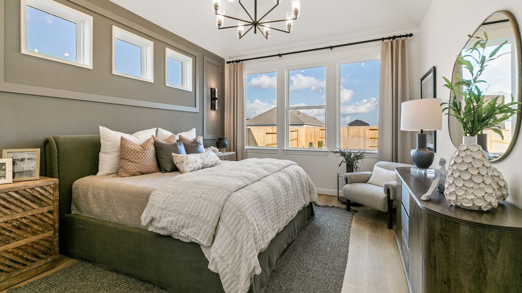 Representative furnished interior of a home built from the Rosewood by Brightland Homes in Sunterra, Katy (Image 14).