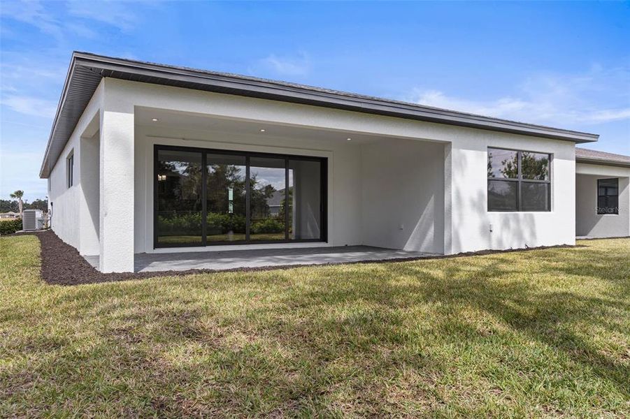 Exterior details and patio area of a home in Woodland Preserve, Parrish (Image 16). Exterior details and patio area of a home in Woodland Preserve, Parrish (Image 16).