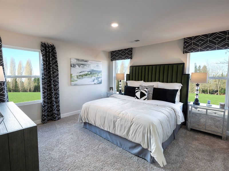 The primary suite features a walk-in closet. Photography from Foxcroft Townes. The primary suite features a walk-in closet. Photography from Foxcroft Townes.