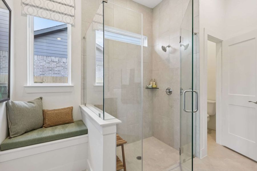 Furnished interior view inside a new home in Sunterra, Katy (Image 13).