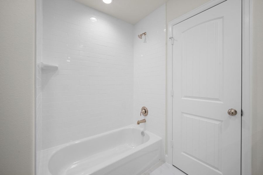 The tub surround and subway tile in the third-floor bath — clean, well-finished, and move-in ready. The tub surround and subway tile in the third-floor bath — clean, well-finished, and move-in ready.