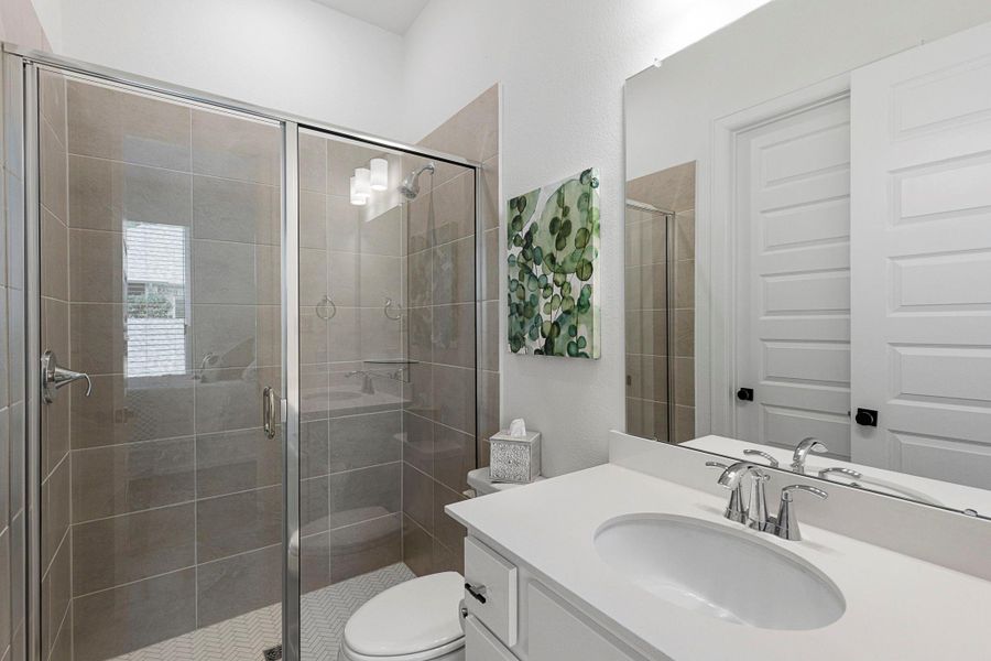 En-suite secondary bathroom.