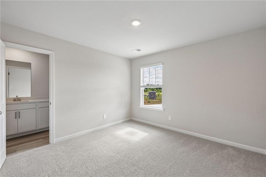 Spacious, unfurnished interior of a new home in Artisan Walk, Fairburn (Image 24).