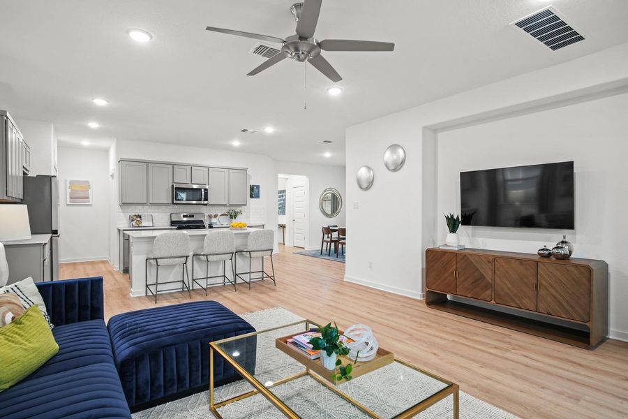 Living room in the Oak home plan by Trophy Signature Homes – REPRESENTATIVE PHOTO