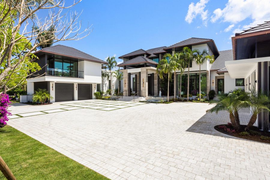 Front exterior of a new home in , Jupiter, FL, highlighting curb appeal (Image 31).