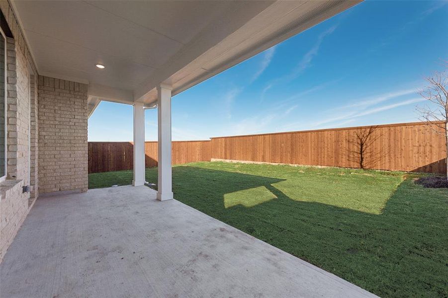 Exterior details and patio area of a home in Wildflower Ranch, Justin (Image 3).