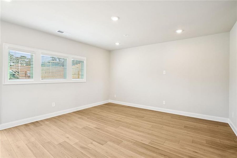 Spacious, unfurnished interior of a new home in Hemingway - Highland Series, Cumming (Image 23).