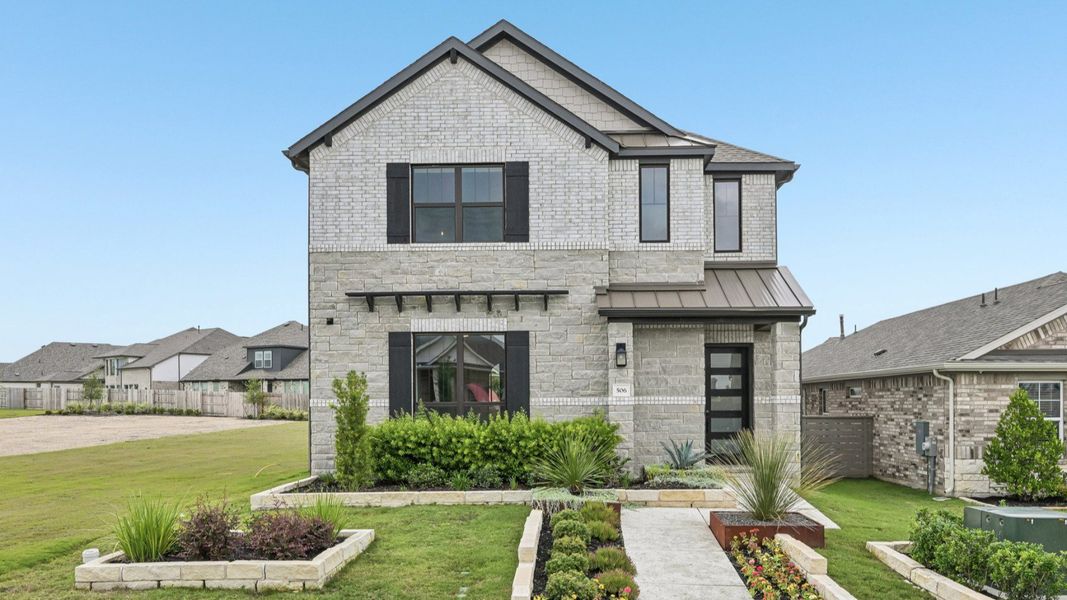 Representative exterior photo of a completed home built from the Hemingway I by DRB Homes in Flora, Hutto, TX (Image 21). Representative exterior photo of a completed home built from the Hemingway I by DRB Homes in Flora, Hutto, TX (Image 21).