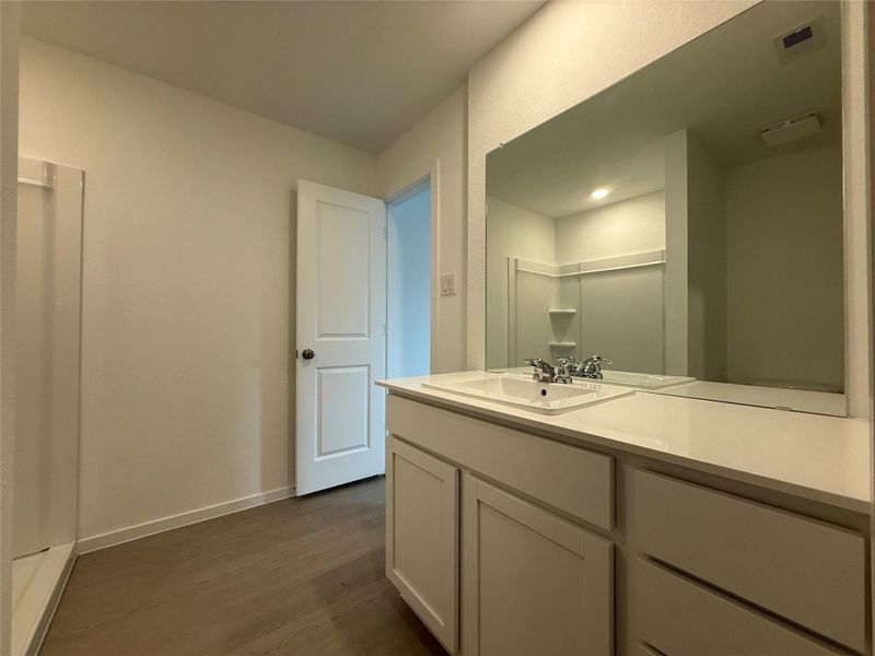 Furnished interior view inside a new home in Sweetgrass Village: Cottage Collection, Crosby (Image 6).