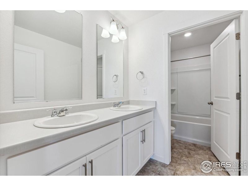 Furnished interior view inside a new home in Silver Peaks, Lochbuie (Image 7).