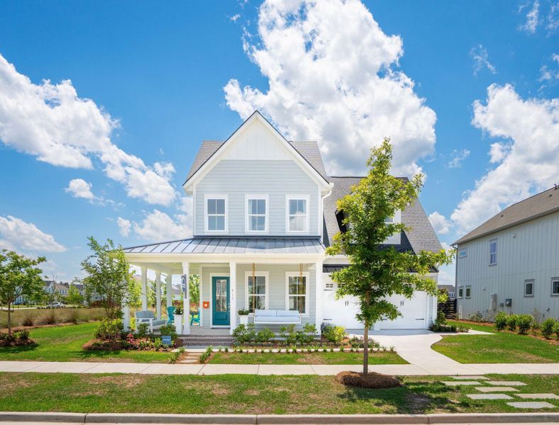 Front exterior of a new home in Nexton, Summerville, SC, highlighting curb appeal (Image 1). Front exterior of a new home in Nexton, Summerville, SC, highlighting curb appeal (Image 1).