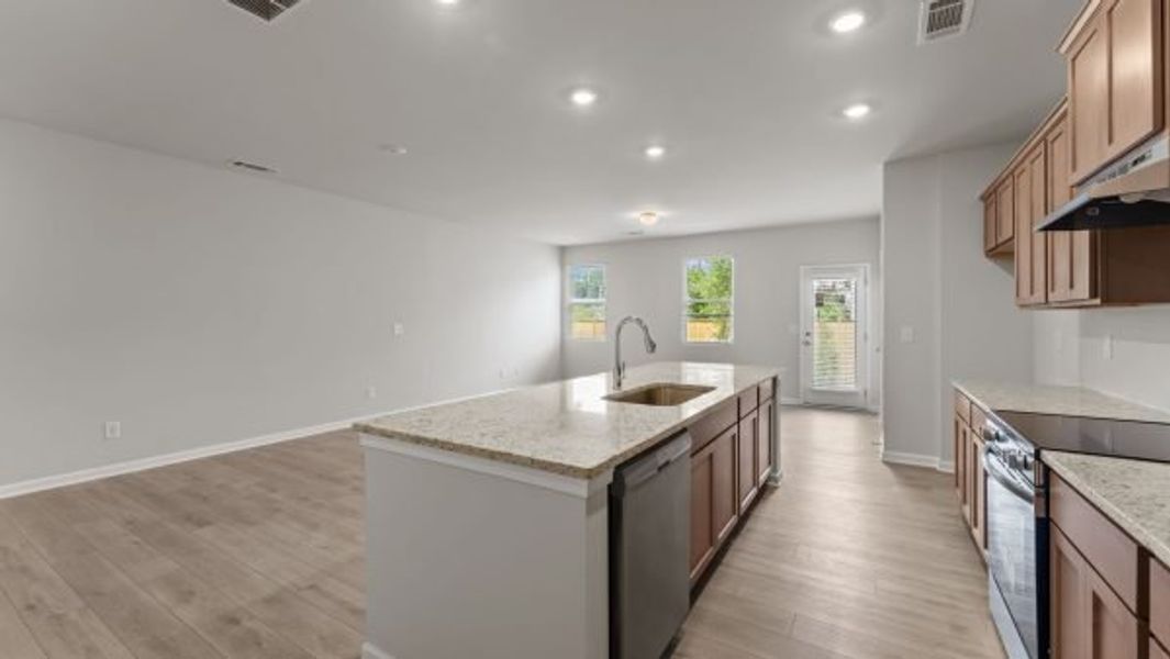 Representative furnished interior of a home built from the Turner by Piedmont Residential in Owen Preserve, Canton (Image 5).