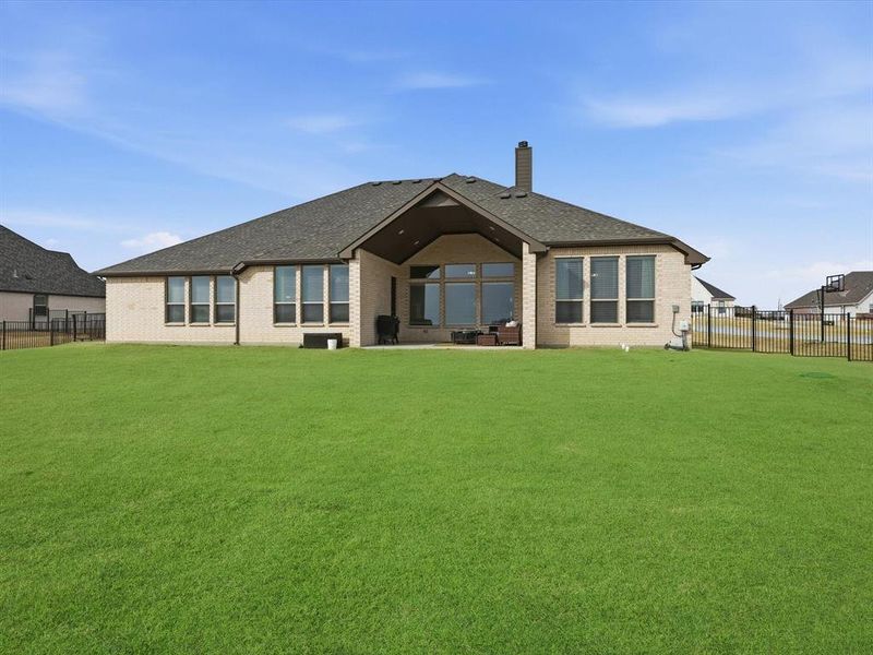 Exterior details and patio area of a home in , New Fairview (Image 22).