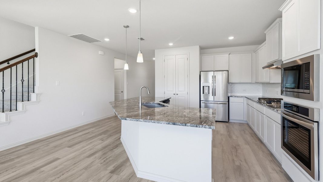 Furnished interior view inside a new home in Green Oaks Preserve, Arlington (Image 12). Furnished interior view inside a new home in Green Oaks Preserve, Arlington (Image 12).