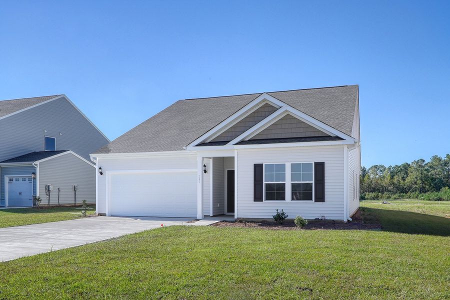 Front exterior of a new home in Allston Park, Calabash, NC, highlighting curb appeal (Image 2). Front exterior of a new home in Allston Park, Calabash, NC, highlighting curb appeal (Image 2).