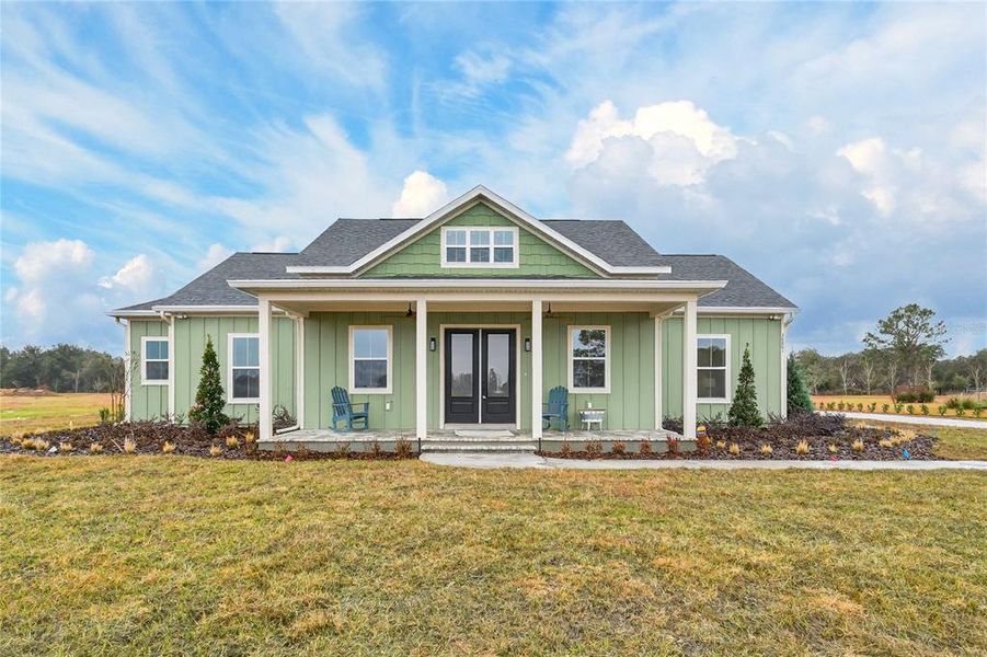Front exterior of a new home in , Umatilla, FL, highlighting curb appeal (Image 2). Front exterior of a new home in , Umatilla, FL, highlighting curb appeal (Image 2).