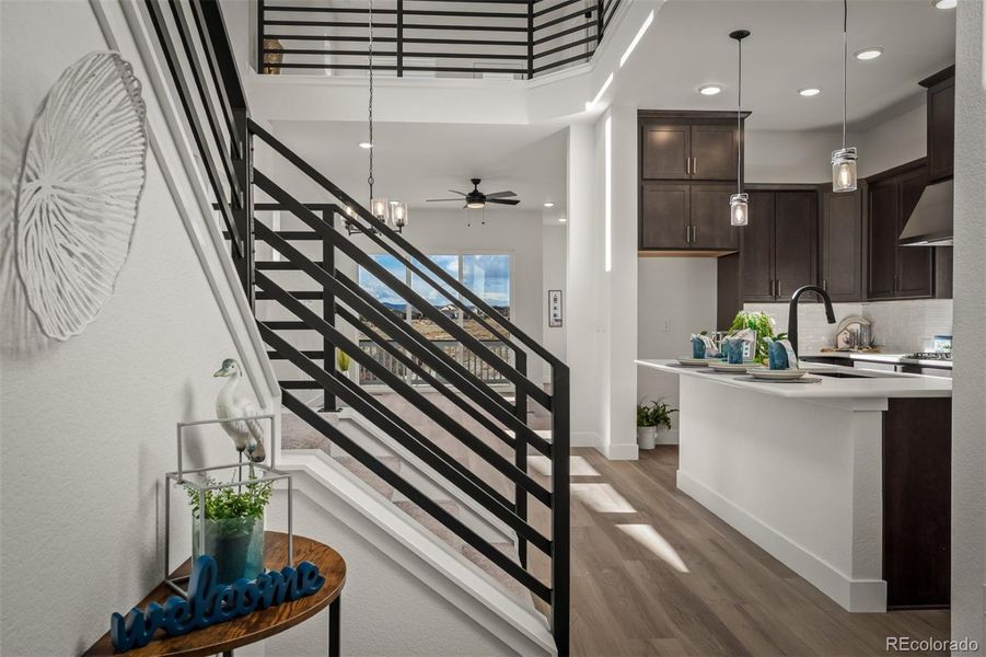 Furnished interior view inside a new home in Revel Crossing at Wolf Ranch - The Panorama Collection, Colorado Springs (Image 11).