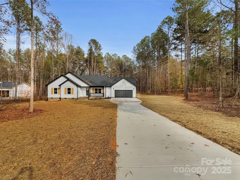 Front exterior of a new home in , Lancaster, SC, highlighting curb appeal (Image 25).