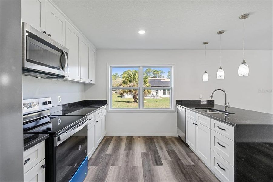 Furnished interior view inside a new home in , Kissimmee (Image 2). Furnished interior view inside a new home in , Kissimmee (Image 2).